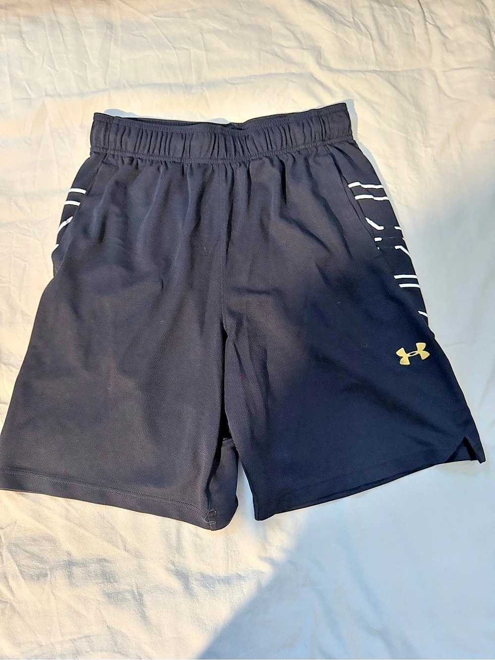 Under Armour Select Basketball Shorts Black, White, and Gold. Size Medium